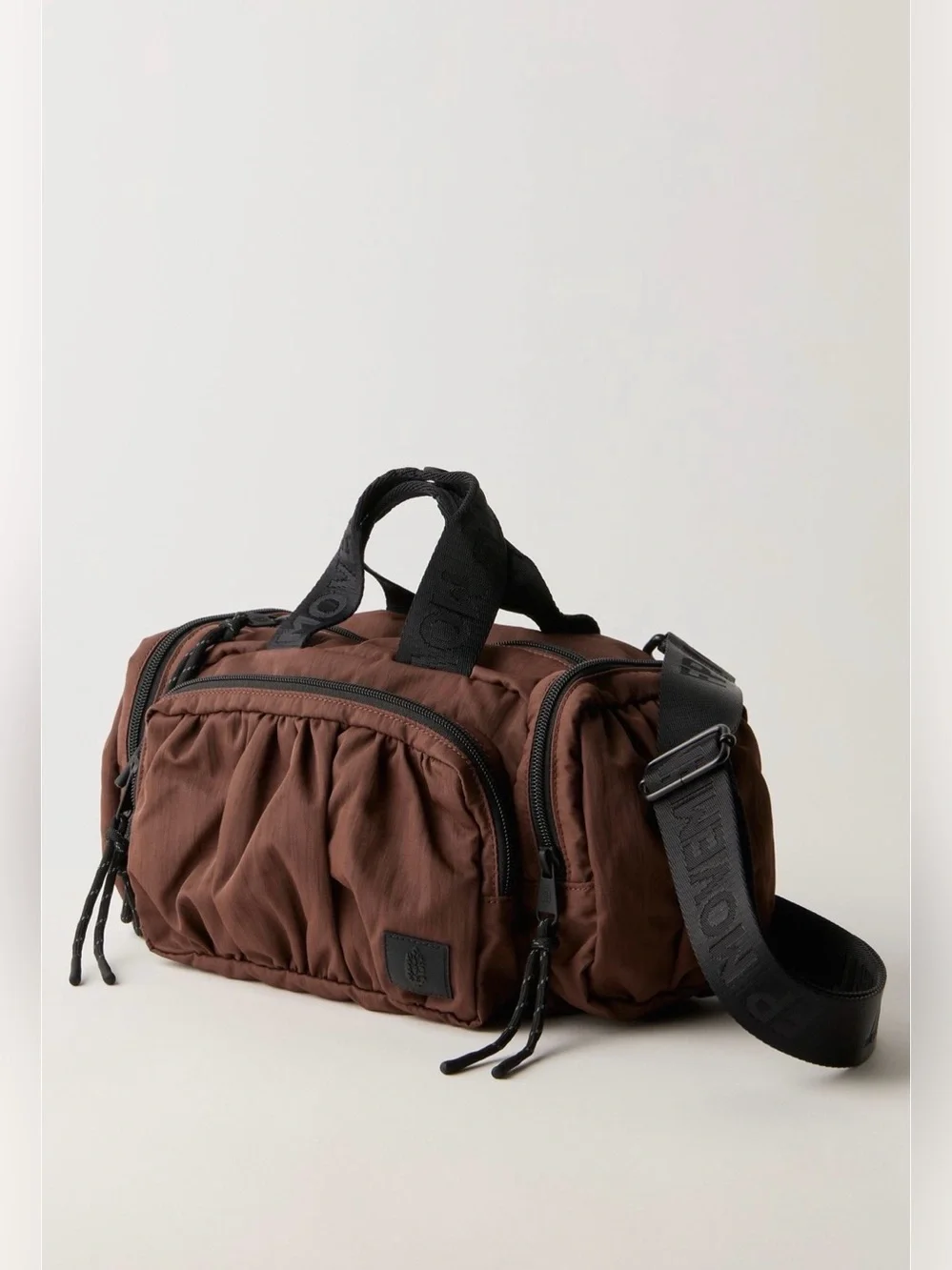 Free people never still convertible sling bag